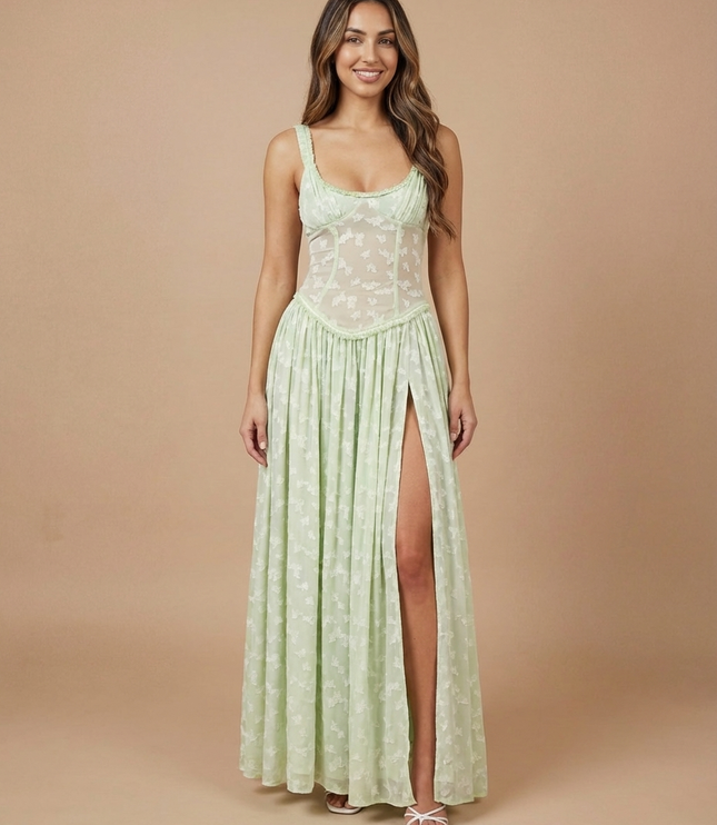 Front view of light green summer floral maxi dress with sheer bodice and thigh-high slit