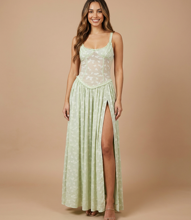 Light green floral maxi dress with sheer corset bodice, spaghetti straps, and high slit