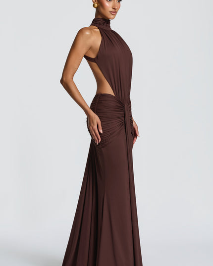 Close front view of brown halter maxi dress with ruched bodice and side cutouts