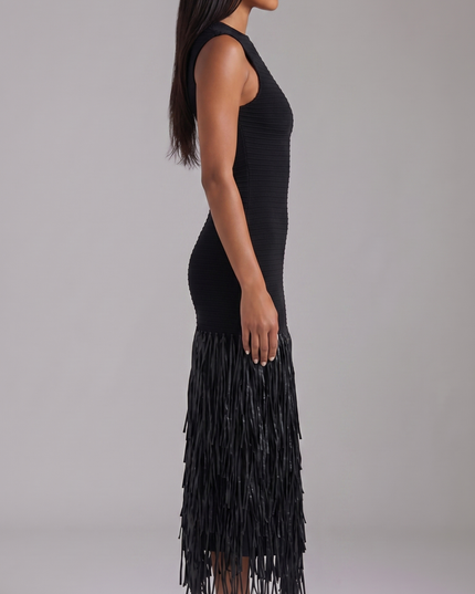 Back view of black sleeveless midi dress with deep open back and fringe hem