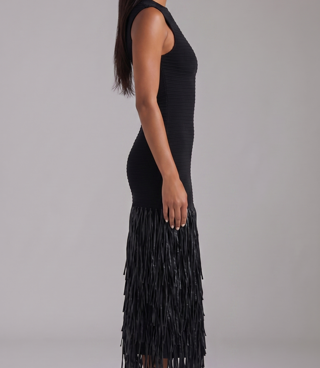 Back view of black sleeveless midi dress with deep open back and fringe hem