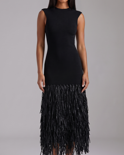 Black sleeveless midi dress with ribbed texture and long fringe hem