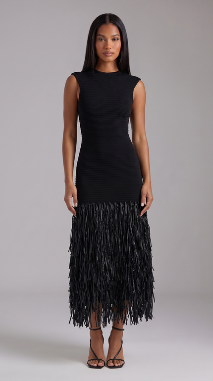 Black sleeveless midi dress with ribbed texture and long fringe hem