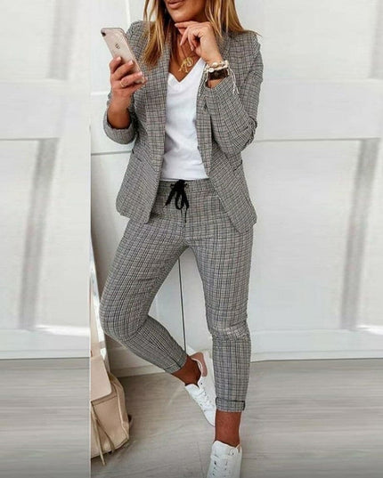 Gray plaid long sleeve blazer with matching tapered pants and white top