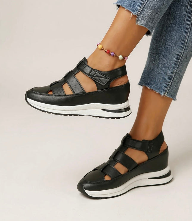 White platform sandals with adjustable straps and black white sole detail