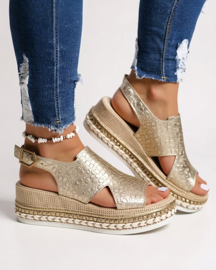 Pair of metallic gold croc peep toe platform sandals with chunky textured sole