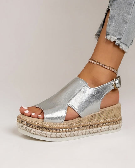 Silver metallic croc platform sandals worn with light jeans, peep toe and strap detail
