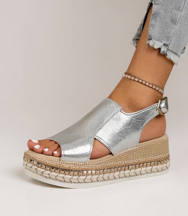 Silver metallic croc platform sandals worn with light jeans, peep toe and strap detail