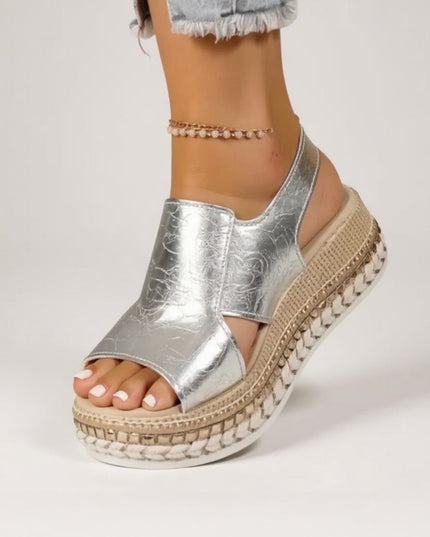 Silver metallic croc platform sandals with peep toe, textured sole, and ankle buckle