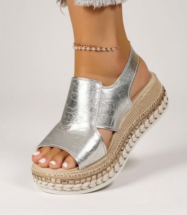 Silver metallic croc platform sandals with peep toe, textured sole, and ankle buckle
