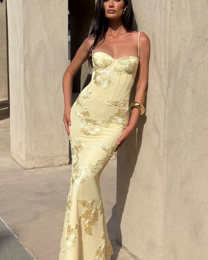 Front view cream prom dress with gold floral embroidery and thin straps