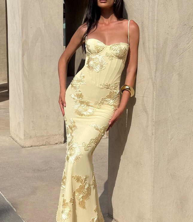 Front view cream prom dress with gold floral embroidery and thin straps