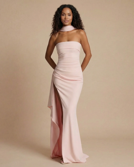 Blush pink strapless ruched maxi dress with draped asymmetrical hem
