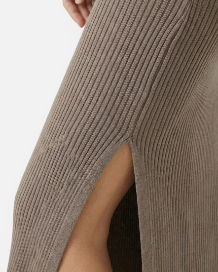 Close-up of taupe ribbed maxi dress showing side slit detail