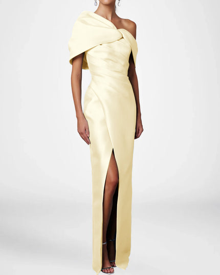 Pale yellow satin one shoulder maxi dress with draped bow accent