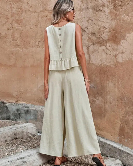 Back view of cream ruffle top with button detail and wide leg lounge pants
