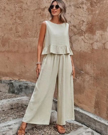 Cream crew neck loungewear top with ruffle hem and wide leg pants set