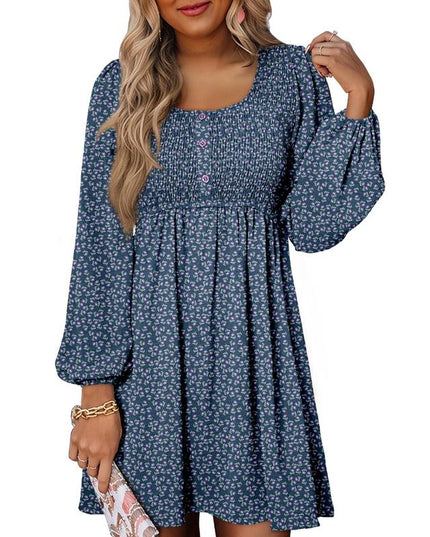 Navy floral smocked empire waist mini dress with long balloon sleeves