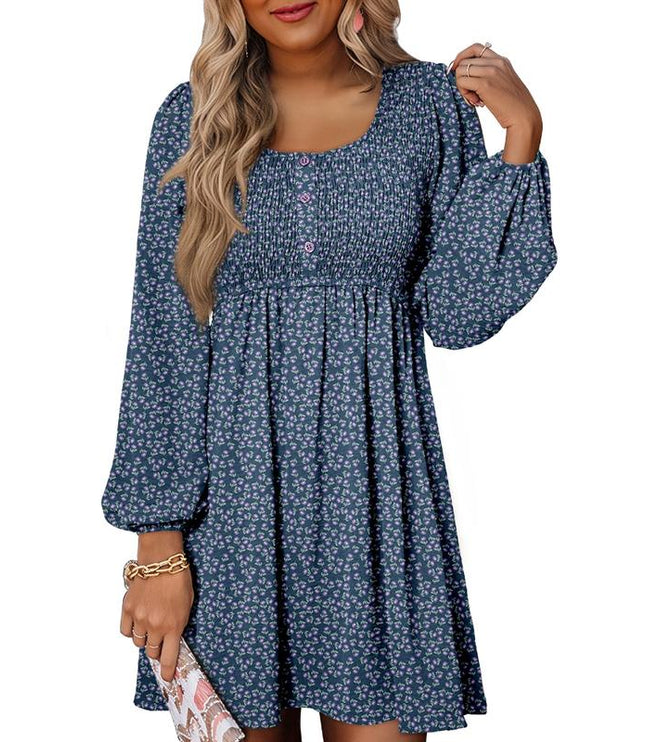 Navy floral smocked empire waist mini dress with long balloon sleeves