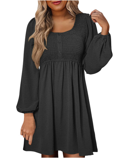 Black smocked empire waist mini dress with long balloon sleeves