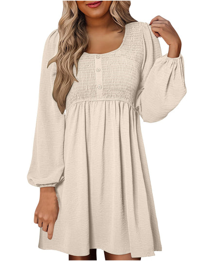 Cream smocked empire waist mini dress with puffed long sleeves