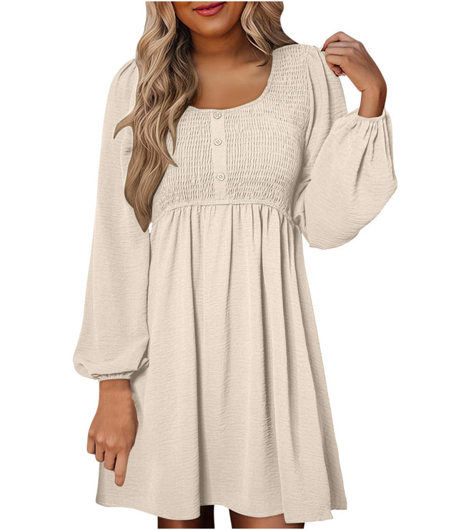Cream smocked empire waist mini dress with puffed long sleeves