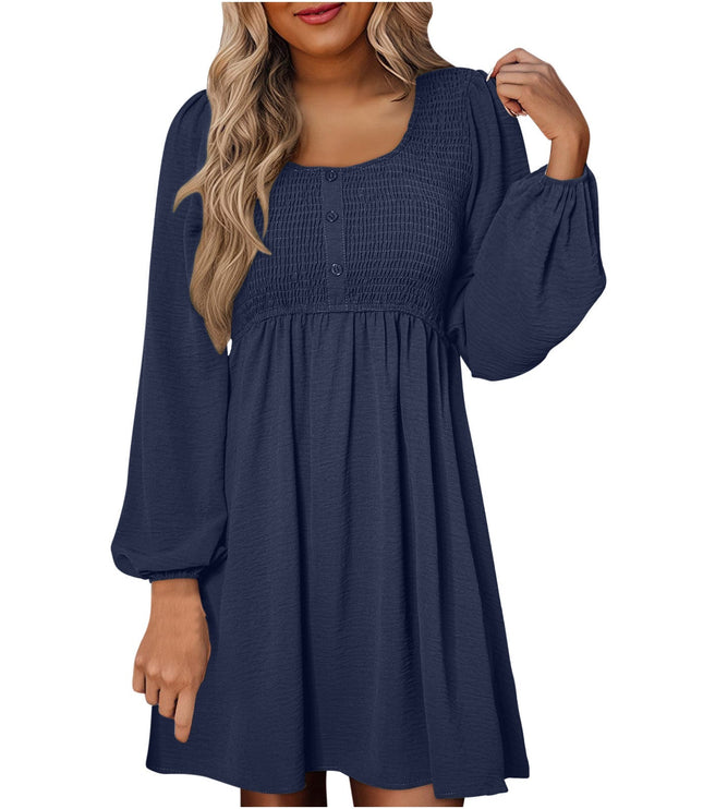 Navy blue smocked empire waist mini dress with puffed long sleeves