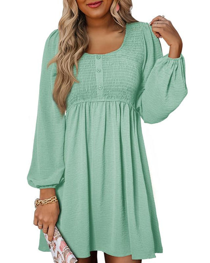 Mint green smocked empire waist mini dress with long puffed sleeves