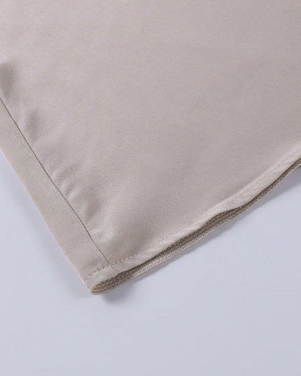 Beige maxi dress hem detail showing finished seam and drape