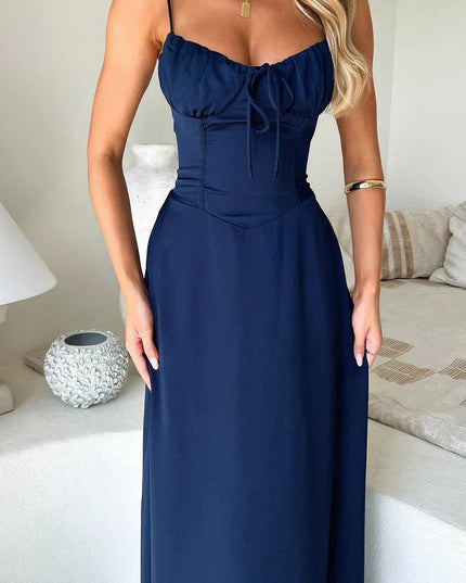 Navy maxi dress with sweetheart neckline, tie bow, and fitted bodice detail