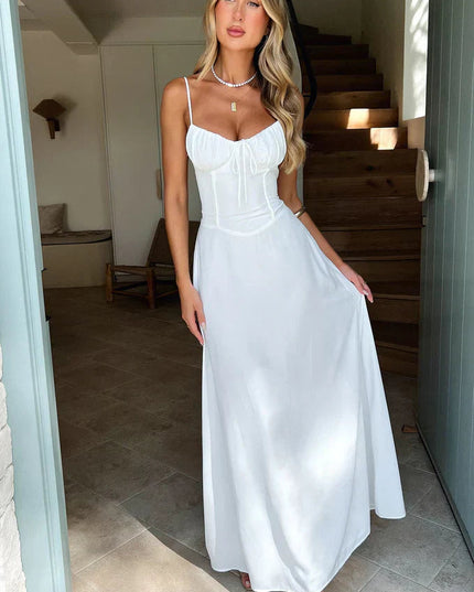 White sweetheart tie bow spaghetti strap maxi dress with flowing silhouette
