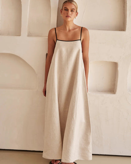 Cream linen spaghetti strap maxi dress with floor-length hem and black trim