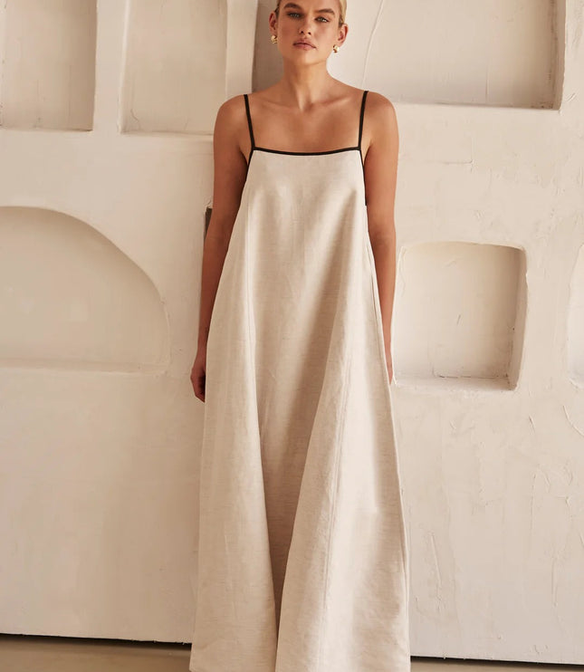 Cream linen spaghetti strap maxi dress with floor-length hem and black trim