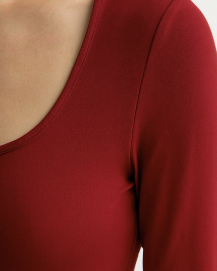 Red square neck long sleeve maxi dress with sleek fitted shape and floor-length skirt