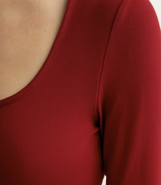 Red square neck long sleeve maxi dress with sleek fitted shape and floor-length skirt