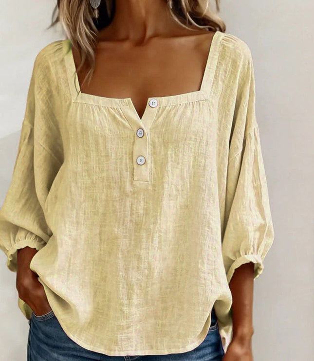 Cream linen button top with square neckline and puffed three-quarter sleeves