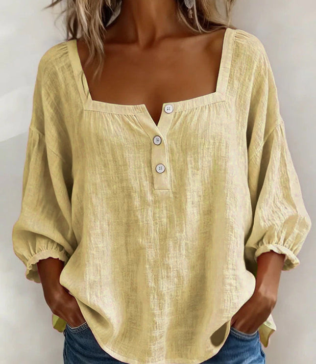 Pale yellow linen square neck puff sleeve button top with textured fabric