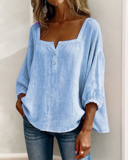 Light blue linen square neck puff sleeve button top with relaxed fit