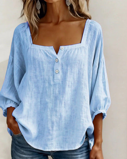 Pale blue linen square neck puff sleeve button top with three-button front