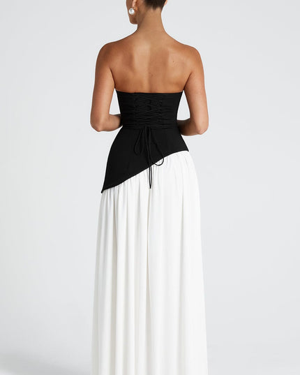 Back view of asymmetrical maxi dress showing black corset lacing