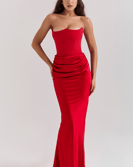 Full-length view of a vibrant red strapless sweetheart corset maxi dress for women, with a draped waist.