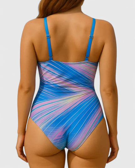 Back view of blue and pink striped wrap-front one-piece swimsuit