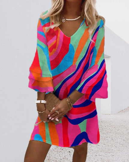Colorful geometric striped mini dress with ruffled bell sleeves and v-neckline