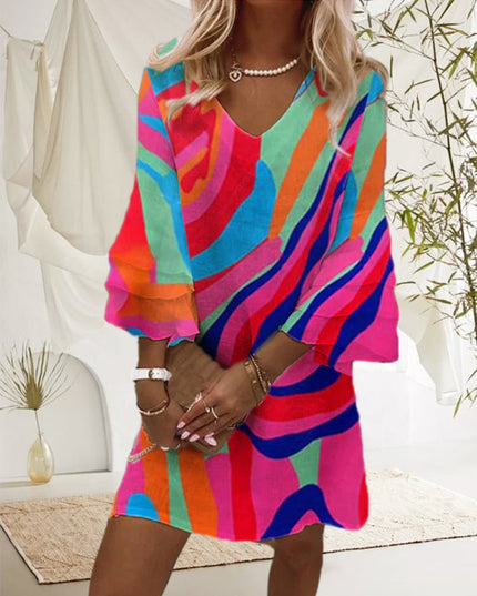 Vibrant rainbow striped summer mini dress with bell sleeves and flowing silhouette