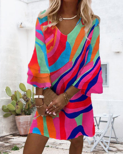 Women's bright multicolor striped mini dress with voluminous bell sleeves and v-neck