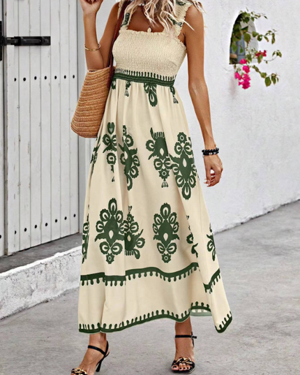 Cream bohemian floral maxi dress with green print, smocked bodice and square neckline