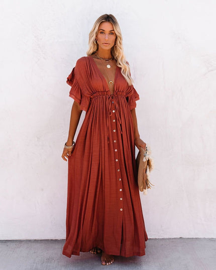 Rust red maxi dress with deep V neck, button front, short flutter sleeves, and gathered waist