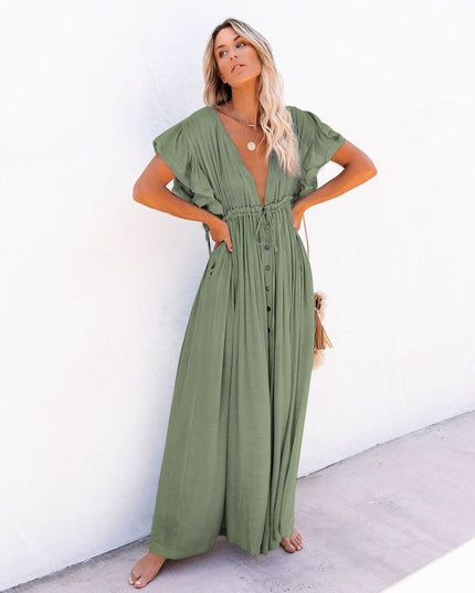 Sage green maxi dress with deep V neck, button front, flutter sleeves, and loose flowing skirt