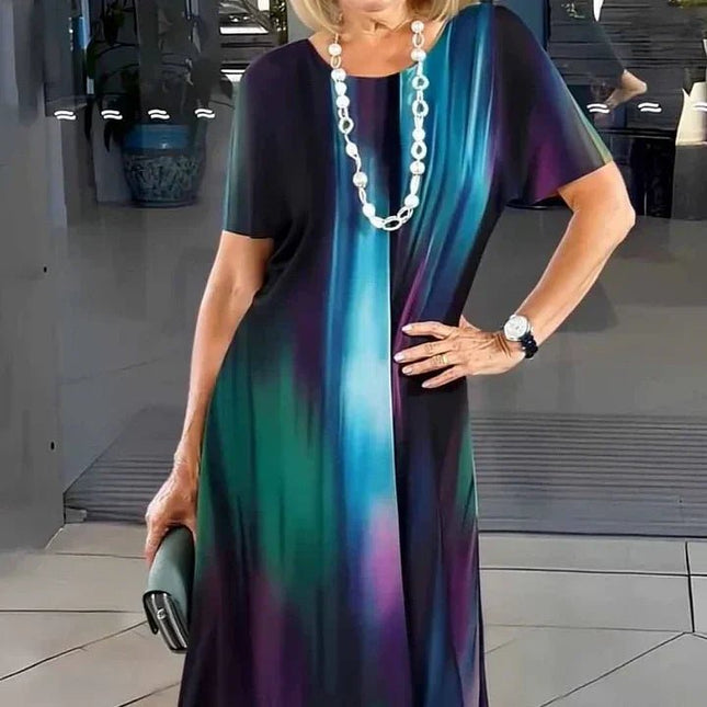 Dark midi dress with teal, purple and green vertical abstract print, casual women’s t shirt dress
