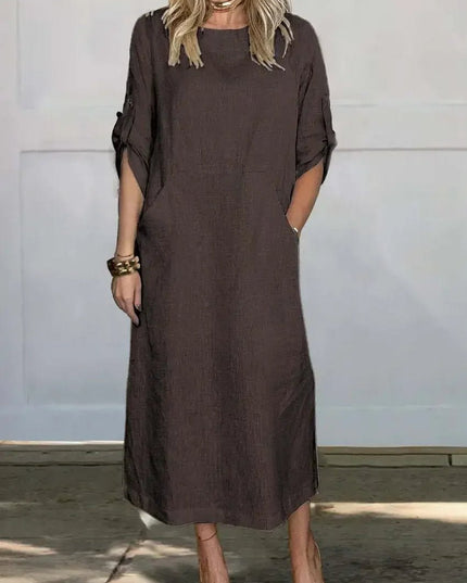 Brown midi dress with pockets, rolled sleeves, and simple relaxed summer fit
